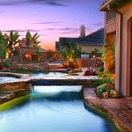 Custom Pool and Spa surrounded by beautiful plants made by Dreamscapes by MGR Southern California's leading custom swimming pool and landscape contractor and design firm.