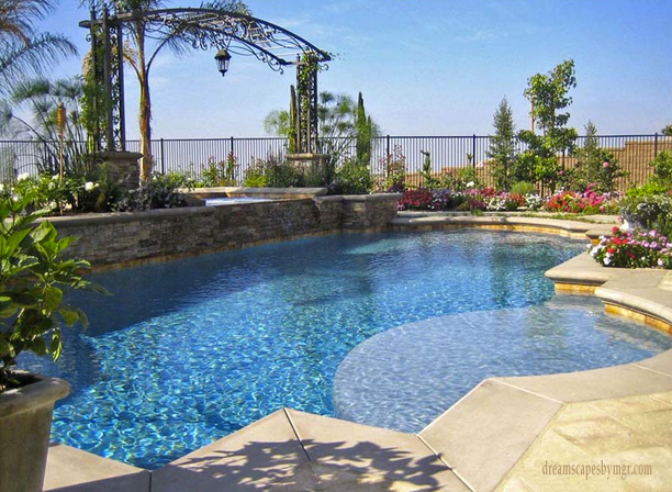 Large Grecian style pool with metal arbor, Dreamscape by MGR leading pool contractor in Orange County